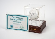 KIM HUGHES: Signed A.G. Thompson cricket ball, in perspex case with CoA. - 2