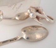 An antique silver plated condiment dish adorned with a kangaroo and cricket bat with cricket ball feet; together with a sterling silver teaspoon with kangaroo top "AUSTRALIA VS. ENGLAND" emblazoned with the 1926 Test team names, 7cm and 10cm high. (2 item - 2