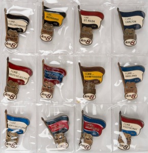 An album containing sixty-eight different VFL club pin badges, each with petroleum company branding e.g. Caltex, Ampol, Mobil, BP, and Shell. (68 items)
