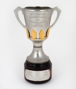 GEELONG PREMIERS: Royal Selangor pewter replica miniature Premiership cup, hand-inscribed "Australian Football League 2007 Premiership Cup - Won By Geelong", with player list engraved on plate to base; height 21cm overall.