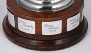 SWANS BEST & FAIREST TROPHY: Original silver-plated trophy mounted on a timber plinth, inscribed "Swann Insurance Perpetual Trophy for Best & Fairest Player - South Melbourne Football Club", the plinth with plaques engraved Norm Goss 1974, Peter Bedford 1 - 5
