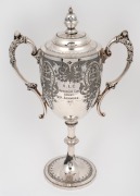 MORDIALLOC CUP: Silver-plated trophy presented by the Victorian Launch Club in 1907 to a W.H. Ashmore of the boat "Nancy Belle", for victory in the Williamstown to Mordialloc race; height 34.5cm.