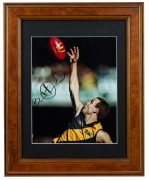 ANTHONY KOUTOUFIDES: AFL-licenced "Marks Of The Decade - MCG, Round 2, April 1996" signed display, limited edition 52/500 with CoA, framed and glazed, 58 x 47cm overall, together with Brad Ottens signed and framed display, 40 x 32cm overall. (2 items) - 2