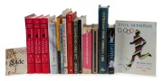 A shelf of books including "International Encylopedia of Women and Sports," (3 vols. 2001), "Australian Sport Through Time," (1997), "The Olympic Games Melbourne 1956," "Australia and the Olympic Games" by Gordon, "Our Don Bradman" by Piesse, "A History o