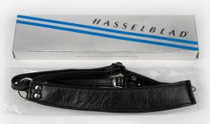 HASSELBLAD: 59099 Contoured Shoulder Strap in original maker's box (new old stock), c. 1987.