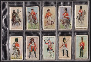 257 · 1912-1938 JOHN PLAYER & SONS: Diverse group comprising 1912 "Regimental Uniforms" complete set [50], 1926 "Cricketers Caricatures By RIP" complete set [50] plus 37 duplicates, 1926 "Straight Line Caricatures" complete set [50], 1926 "Footballers Caricatures By RIP" complete set [50], 1934 "Cricketers" complete set [50] (x2), 1934 "Hints On Association Football" completed album, and 1938 "Cricketers" complete set [50]. (380+ items)