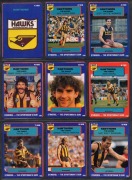 An album containing 1990 Scanlens "Footballers" complete set [168] plus 3 duplicates, 1994 Herald Sun "Cazaly Classics" complete set [100] plus 18 duplicates, together with 118 other cards, mostly AFL but also basketball and boxing; manufacturers include 