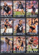 An album containing 1990 Scanlens "Footballers" complete set [168] plus 3 duplicates, 1994 Herald Sun "Cazaly Classics" complete set [100] plus 18 duplicates, together with 118 other cards, mostly AFL but also basketball and boxing; manufacturers include - 2