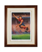 A print of the well-known image of Ron Barassi by d'Arcy W. Doyle, framed and glazed, 90 x 71cm overall; endorsed by Barassi "A Mighty effort for Footy: Ross the Boss - thank you from a footy fan - Ron Barassi", together with "Ron Barassi - Fifty Years A 