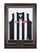NATHAN BUCKLEY: Signed Collingwood jersey, framed and glazed with a plaque recording his 280 games for the club, 114 x 82cm overall.
