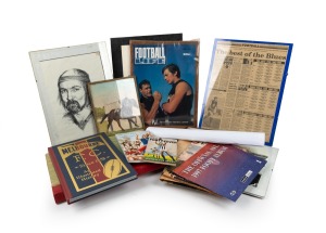 Remainder lot mostly comprising VFL/AFL-related items, including two 2010s WEG posters, six framed images/photographs, a scrapbook containing many newspaper clippings documenting 1960s-70s VFL happenings, three books, and other ephemera. (qty.)