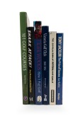 A shelf of large format hardcover books with dust jackets: "The Complete Book of Australian Golf" by Smith (1978); "Tony Jacklin - The Price of Success" by Kahn (1979; signed by Jacklin); "Shark Attack - Greg Norman's guide to aggressive golf" by Norman &