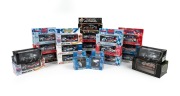 FORD RACING - V8 SUPERCARS: Group of twenty late 1990s early 2000s 1:43 die-cast model cars, together with two Glenn Seton 1:6 die-cast replica metal helmets. (22 items)