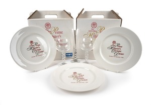 2000 SYDNEY: THE AUSTRALIAN PRIME MINISTER'S OLYMPIC DINNER: Two carry boxes, each containing a set of specially produced dinner plates (3), French crystal wine glasses (2), and a champagne flute (1); the glasses all featuring unusual "2000" stems.