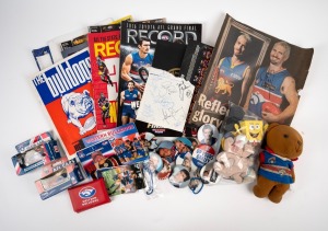 WESTERN BULLDOGS: An accumulation of c. 2000 mostly club-branded items, including Matchbox cars, membership cards, signed ephemera, Football Records, fobs, pin and button badges, a teddy bear, a stamp booklet, and many others. (qty.)