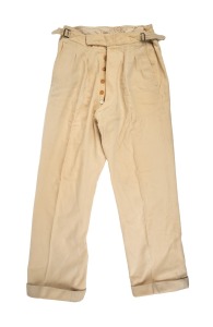 An early pair of Clarrie Grimmett's pure wool cricket flannel trousers, circa late 1920s, maker unknown; much worn. Provenance: The Clarrie Grimmett Collection; his family, by descent.