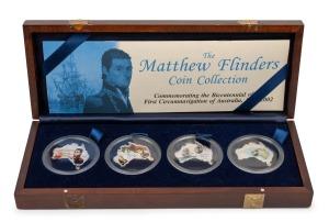 The Matthew Flinders Coin Collection, set of four Bank of Uganda 5000/- Australia-shaped coins; all pure silver and each of 1oz. in an attractive sea-chest styled presentation case.