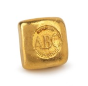 GOLD BULLION: One ounce pure gold ABC ingot.