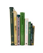 A shelf of books including "Test Match Captains 1876 - 1939" by Webber, "Test Cricket Lists" by Dawson, "Barclays World of Cricket" by Swanton, "The MCC in Australia 1946 - 47", "England versus Australia" by Frith, "A Yankee looks at cricket" by Sayen, "I