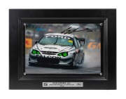 CRAIG LOWNDES - 2001: Ten identical framed and glazed signed photographs of Lowndes in his Gibson Motorsport AU XR8 Falcon, limited edition 71-80/100, each 33 x 43cm overall. (10 items)