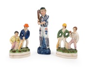 Three early Staffordshire-style figurines, comprising two different models of a man and woman at the wicket (both approx. 16.5cm tall), together with a larger figurine (height 24cm) of a young man in cricket whites holding his bat at the ready. (3 items)