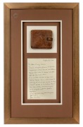 Ron Clarke's personal Melbourne 1956 XVIth Olympiad leather wallet, framed and glazed, 59.6 x 36.5cm overall, with signed September 2000 letter from Clarke regarding the wallet also featured.