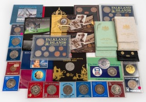 An accumulation of coins, mostly 1970s and 1980s, including many commemoratives or year sets, several in coin cases; countries of issue include New Zealand, U.K. (Falkland Islands), Japan (Mint Bureau sets), Western Samoa, Ethiopia, Fiji, Turkey, etc. (qty.)