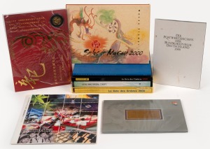 Group of 2000s stamp products, mostly stamps yearbooks in matching albums, issued by the United Kingdom, China (Hong Kong and Macau), France, Sweden, and Germany. (qty.)