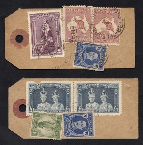 PARCEL TAGS: A 1944 tag bearing a 10/- Robes, 2 x 2/- Roos + 3&frac12;d KGVI sent from BENDIGO to the E.S. & A. Bank in Melbourne; together with another tag, circa 1944, bearing &pound;1 Robes (2), a 1/- Lyrebird + 3&frac12;d KGVI with a similar address. Minor faults. (2 ite