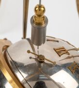 A rare antique French conical pendulum desk clock in nickel plated spherical case with eight day time and strike movement. The gilded tripod stand suspending the pendulum on black marble pontil base with gilt table mount and level adjustment screws, circa - 3