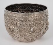 An antique Burmese silver bowl with repousse vignettes and floral decoration, 19th/20th century, 11cm high, 15cm wide, 442 grams. - 4