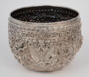 An antique Burmese silver bowl with repousse vignettes and floral decoration, 19th/20th century, 11cm high, 15cm wide, 442 grams. - 5