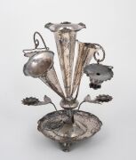 A pair of antique Chinese export silver epergnes with floral decoration, 19th/20th century, seal mark to base, ​​​​​​​21cm high, 569 grams total. - 2