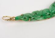 A pair of Chinese carved jade earrings mounted in 14ct gold, 20th century, ​​​​​​​7.5cm high. - 7