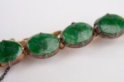 A Chinese 14ct gold bracelet, set with five cabochon jade stones, each mounted in gilded silver, stamped "14" with seal mark, ​​​​​​​8.1 grams total. - 5