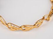 A Chinese 14ct gold bracelet, set with five cabochon jade stones, each mounted in gilded silver, stamped "14" with seal mark, ​​​​​​​8.1 grams total. - 6