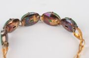 A Chinese 14ct gold bracelet, set with five cabochon jade stones, each mounted in gilded silver, stamped "14" with seal mark, ​​​​​​​8.1 grams total. - 7