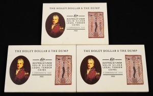 SILVER - THE HOLEY DOLLAR & THE DUMP: Three 1988 commemorative sets, each comprising 1oz Holey Dollar and 1/4oz Dump, all in original packaging. (3 items)
