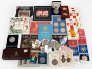 GREAT BRITAIN: An accumulation of British decimal and pre-decimal currency, including several uncirculated year sets, carded coin isues, a quantity of loose coins (noted 1935 and 1937 Crowns), and more. (qty.)