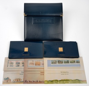 Group of twelve different 2002 United States Postal Service "United We Stand" gold-plated .999 silver stamp ingots, most still sealed in card packaging, together with matching album, plus some Australia Post stamp packs.