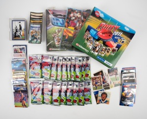 TRADING CARDS: An accumulation of trading cards, mostly Select/Herald Sun/Cazaly Classics and featuring Western Bulldogs players, including many 2011 Herald Sun cards in matching album, 2012 Herald Sun full base set (all still in sealed packs) with matching album, fifteen signed cards (mostly Robert Murphy), and many others, plus thirteen stickers. (qty.)