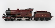 HORNBY (O Gauge) vintage tinplate electric locomotive and tender in burgundy livery.