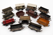 HORNBY (O Gauge) electric locomotive and tender with eleven goods wagons, (13 items).
