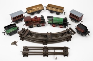 HORNBY (O Gauge) two tinplate locomotives (clockwork and electric); together with two passenger cars, tender, two goods wagons and a small quantity of track, (qty).
