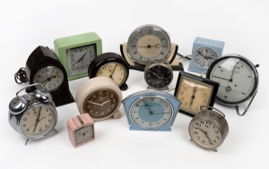 Thirteen assorted vintage wind-up and electric clocks in bakelite and nickel cases, 20th century, the largest 17cm high.