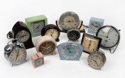 Thirteen assorted vintage wind-up and electric clocks in bakelite and nickel cases, 20th century, the largest 17cm high.