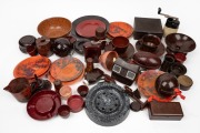 Assorted vintage brown and mottled bakelite objects including advertising ware, tea ware, ashtrays, viewfinder etc., (qty).