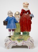 YARDLEY'S OLD ENGLISH LAVENDER porcelain point of sale advertising figure group, manufactured by Dresden, circa 1930s; together with a 1987 publication of Australian Pharmacist which features the piece on the front cover and includes an expose of same. (2 - 3
