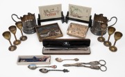 Russian silver plated tea glass holders, trinket box, letter knife and grape scissors; together with four assorted silver teaspoons, Chinese faux ivory panels and a Peruvian folk art picture and six Indian brass goblets, 20th century, (qty).