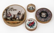 A group of four assorted antique French and Continental circular confectionary boxes of gilt metal construction with reverse glass decoration, 19th century, ​​​​​​​the largest 15cm diameter.